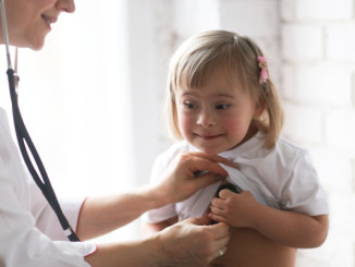 Little girl having her heart checked